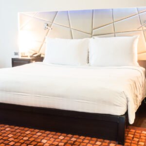 white pillow on bed